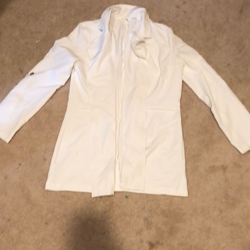 A white blazer, large and only worn once.